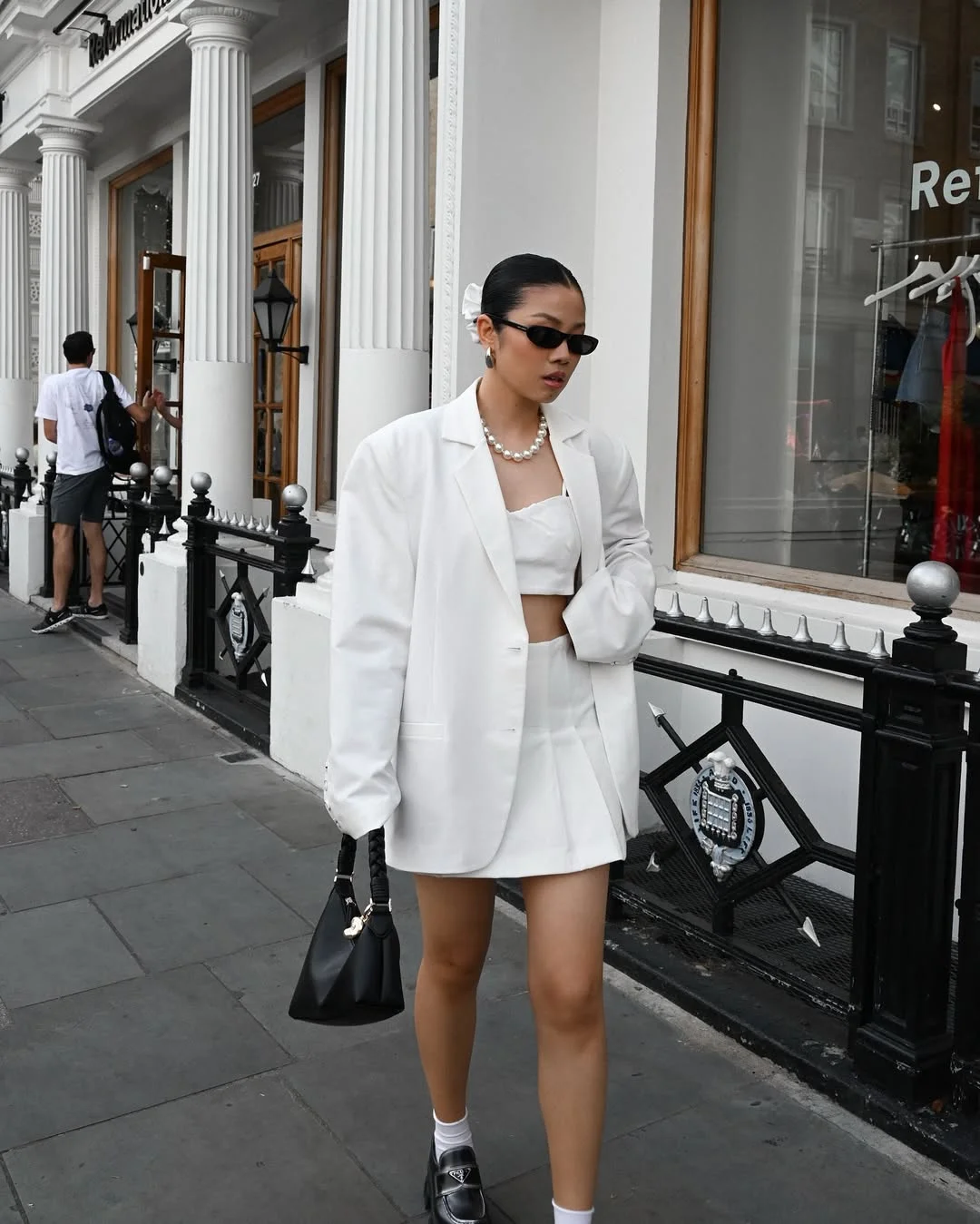 cool summer streetwear 2026 All White Layers With a Sharp Street Statement
