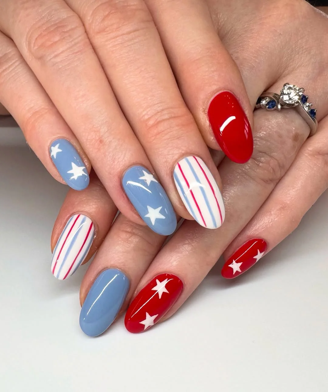 4th of july nails 2026 + Powder Blue Stars and Candy Stripe Oval Nails