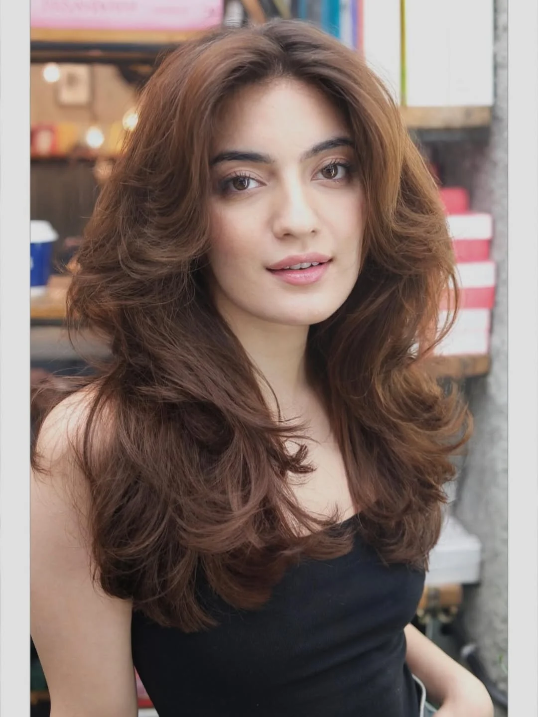 angled summer haircut for round face 2026 + Chestnut Feathered Layers With a Soft 70s Sweep