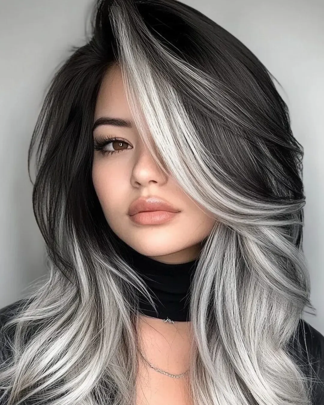 angled summer haircut for round face 2026 + High-Contrast Silver Framing for a Bold Angled Effect