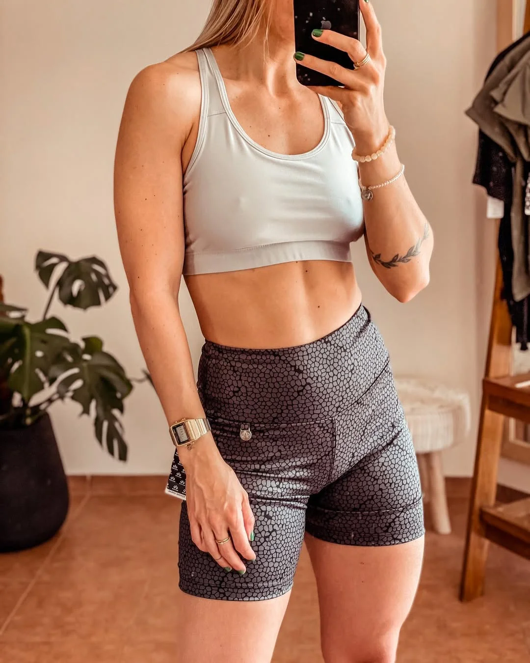 biker shorts outfits summer 2026 Animal Print Biker Shorts With A Soft Grey Sport Bra