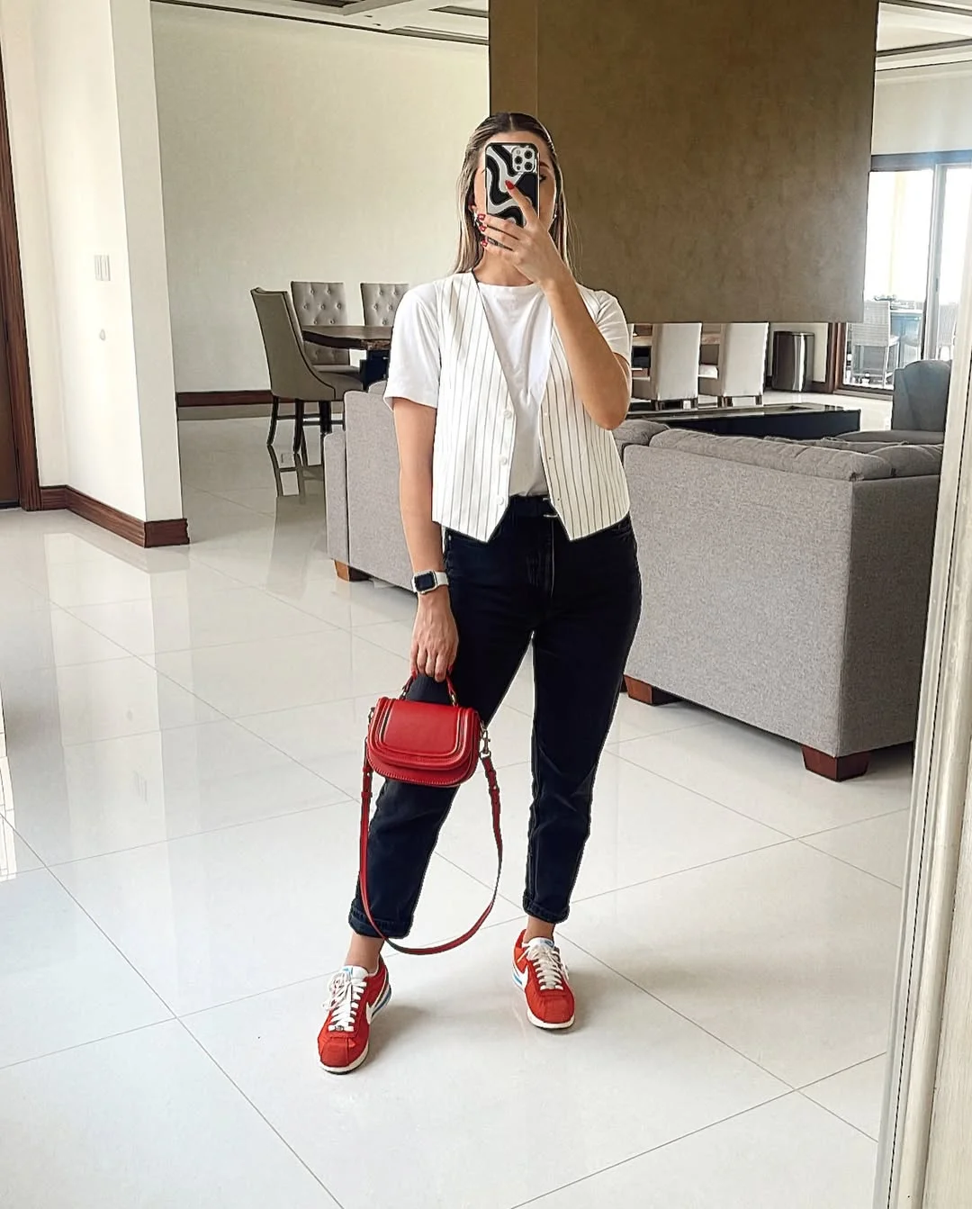 casual friday summer outfits with sneakers 2026 Pinstripe Vest With Black Jeans And Red Sneakers