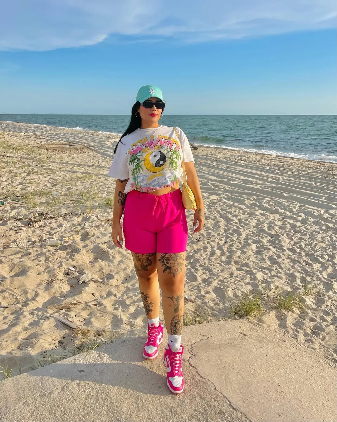 casual friday summer outfits with sneakers 2026 Beach-Bright Graphic Tee With Pink Sneaker Energy