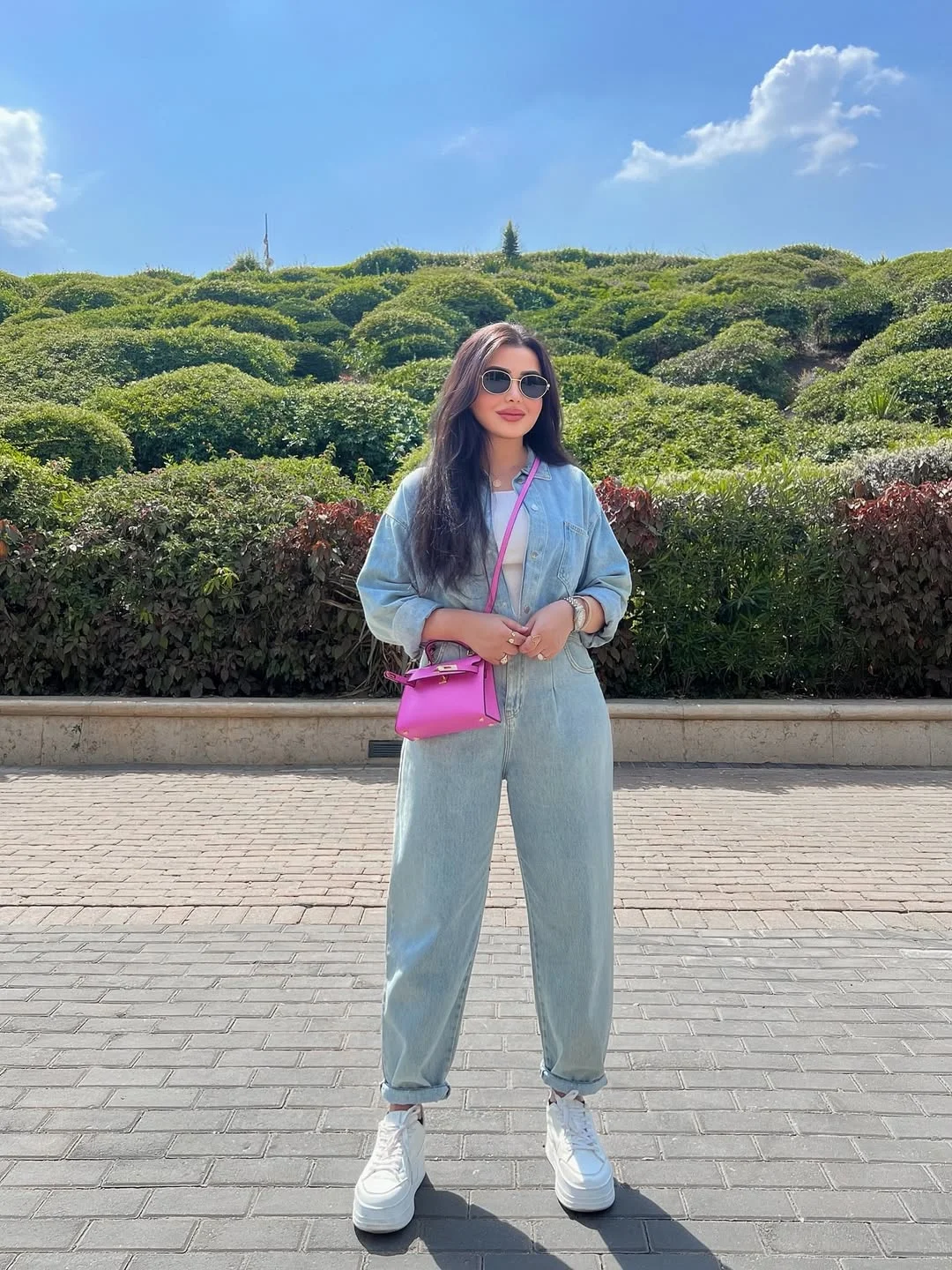 casual friday summer outfits with sneakers 2026 Soft Denim Jumpsuit With a Pink Power Detail