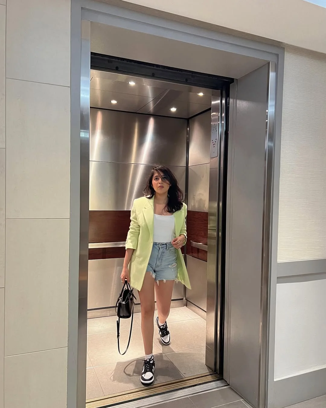 casual summer blazer outfits 2026 Lime Blazer With Denim Cutoffs And Sneakers