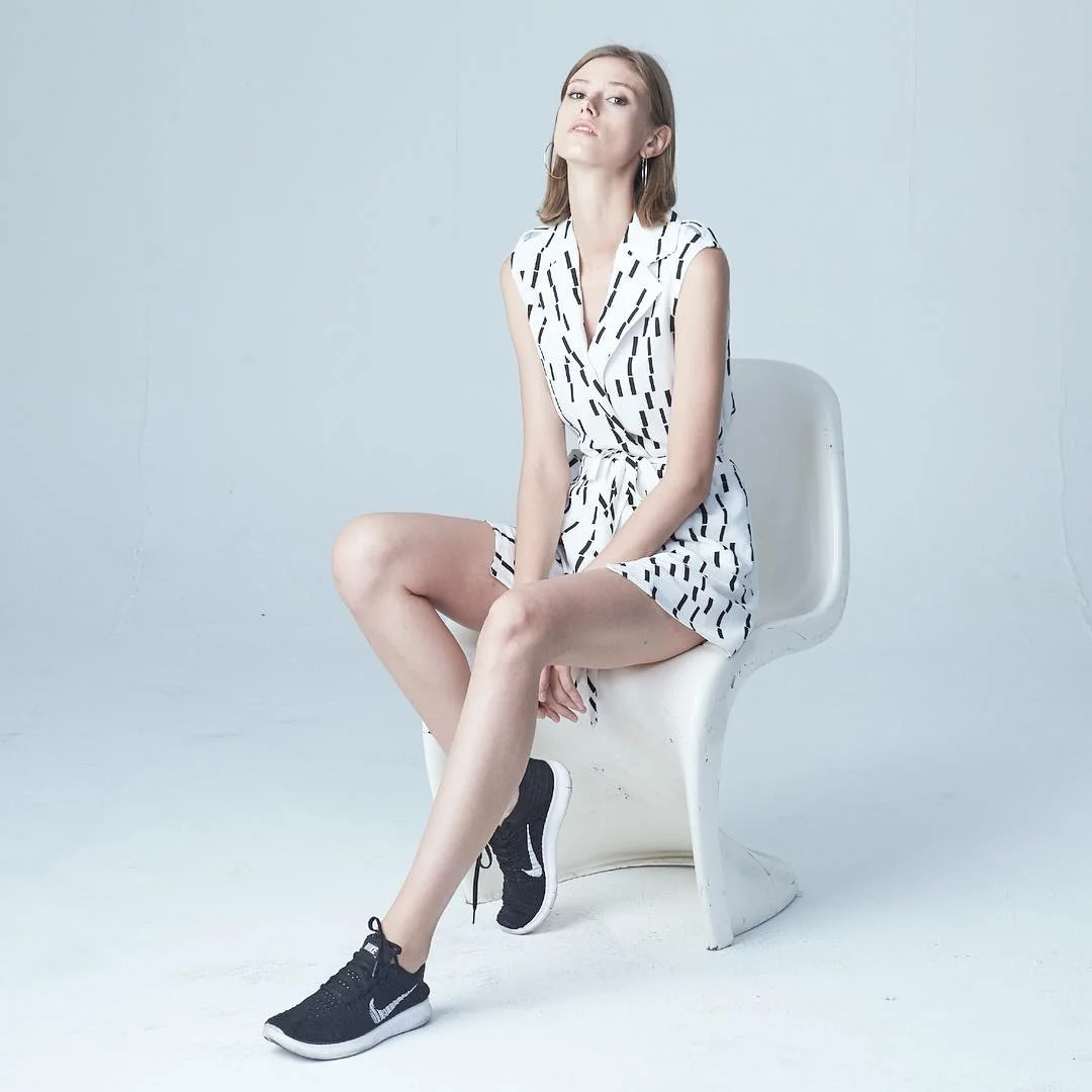 casual summer blazer outfits 2026 Sleeveless Wrap Blazer Romper With Sporty Sneakers