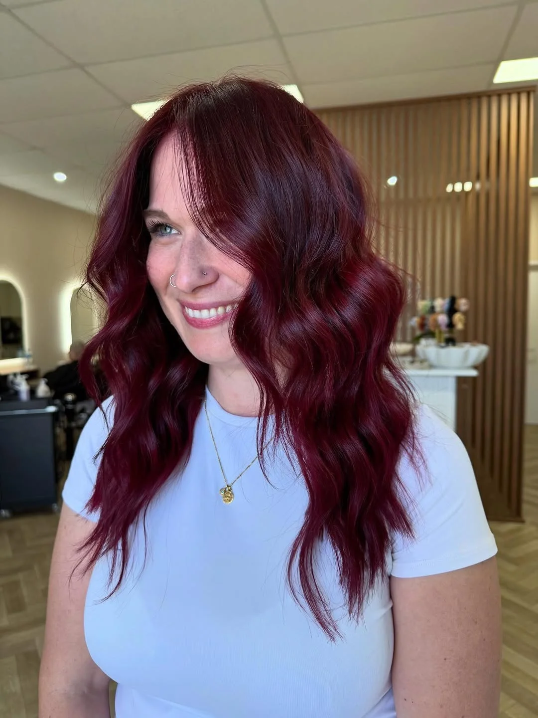 cherry summer red hair color 2026 + Deep Burgundy Beach Waves With a Bright White Tee