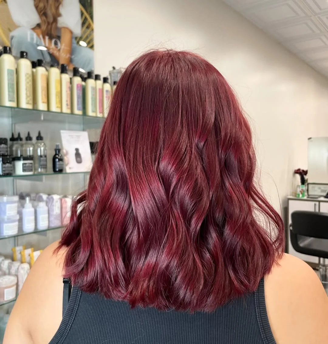cherry summer red hair color 2026 + Deep Cherry Waves With a Rounded Lob Shape