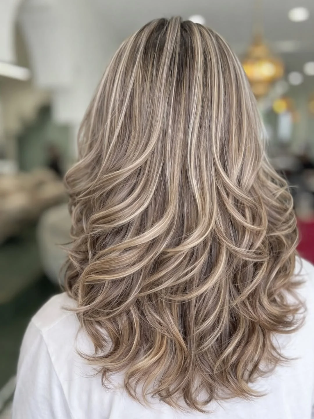 choppy summer haircuts for thin fine hair 2026 + Long Feathered Layers With Sandy Blonde Ribbons