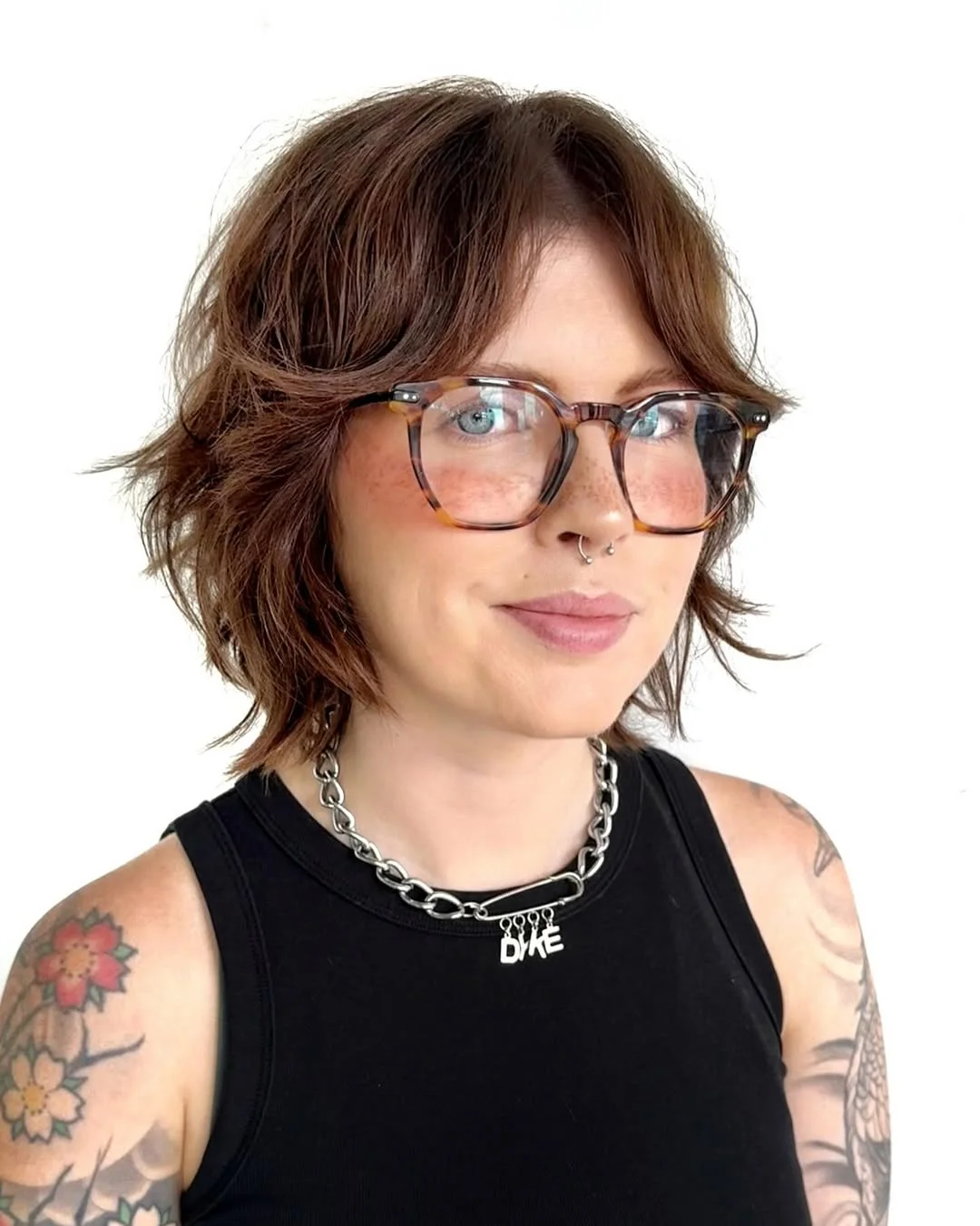 choppy summer haircuts for thin fine hair 2026 + Coppery Choppy Shag Bob With Curtain Movement
