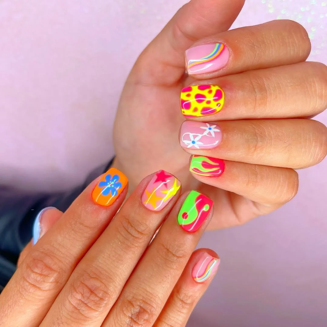 funky summer nails 2026 + Neon Mix and Match Nails with Floral Flames