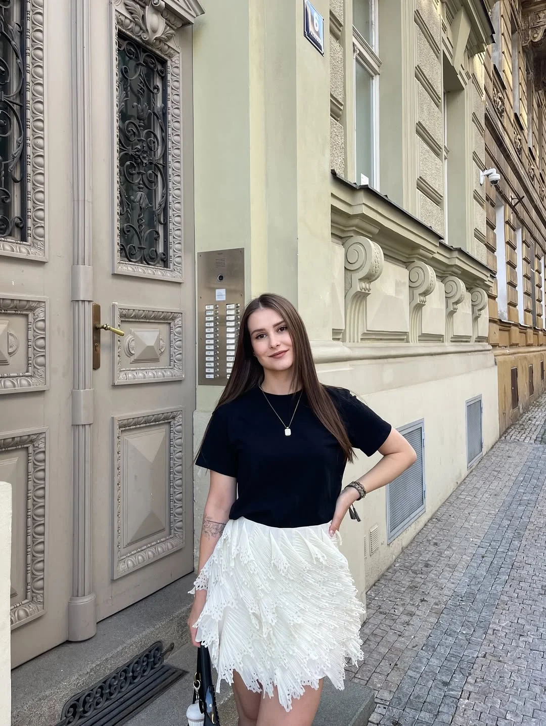 hot weather summer outfits 2026 Black Tops And White Textured Skirts Create The Perfect Contrast