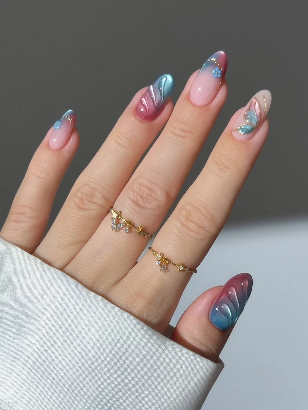 June Nail Colors ideas - Summer Trends 2026 Iridescent Aura Nails With Mermaid-Inspired Chrome Details