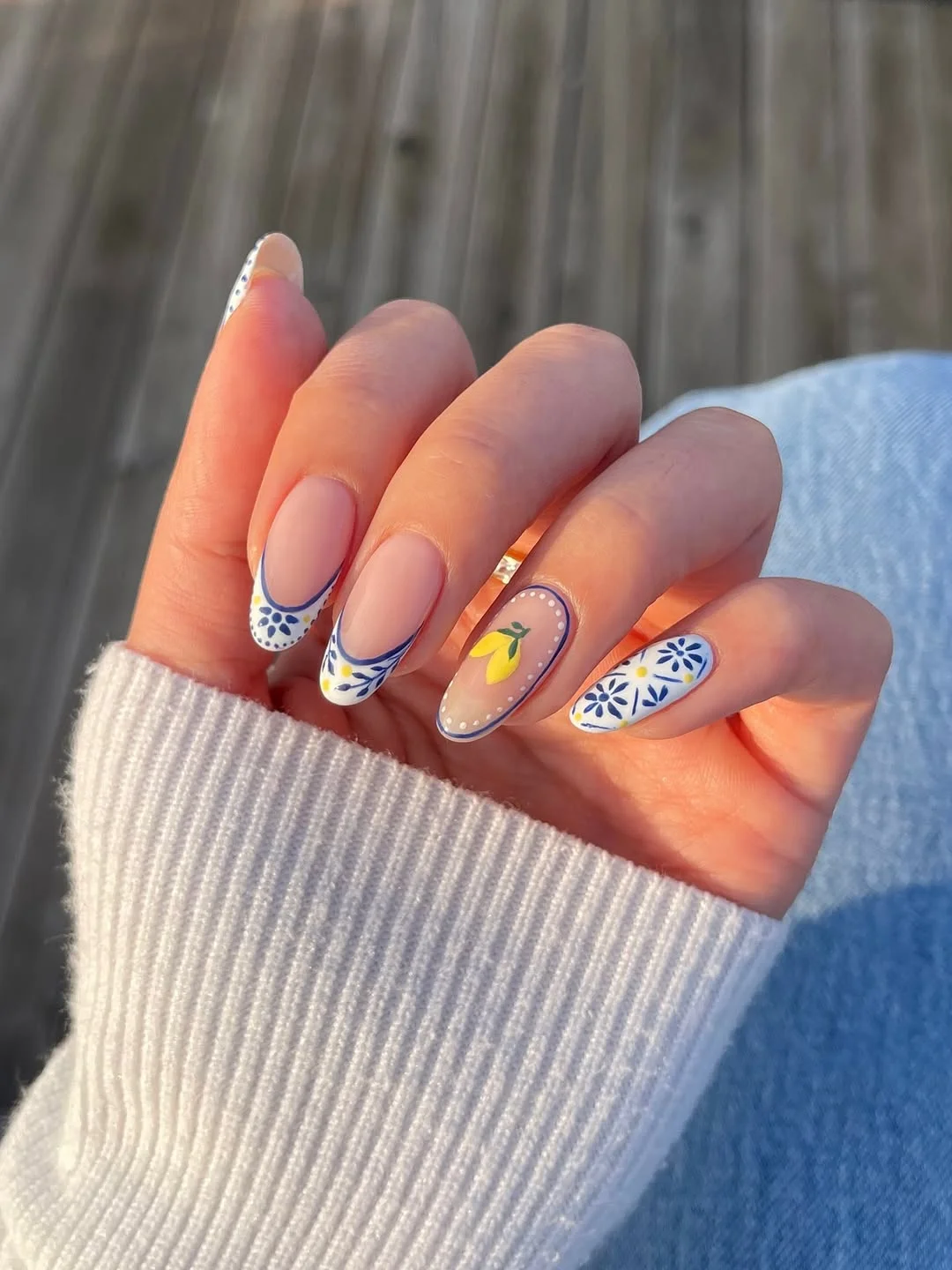 June Nail Colors ideas - Summer Trends 2026 Mediterranean Blue Floral Nails With Lemon Accents