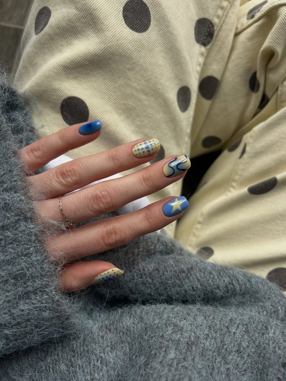 summer nails ideas june Retro Blue and Cream Graphic Nails With Vintage Energy
