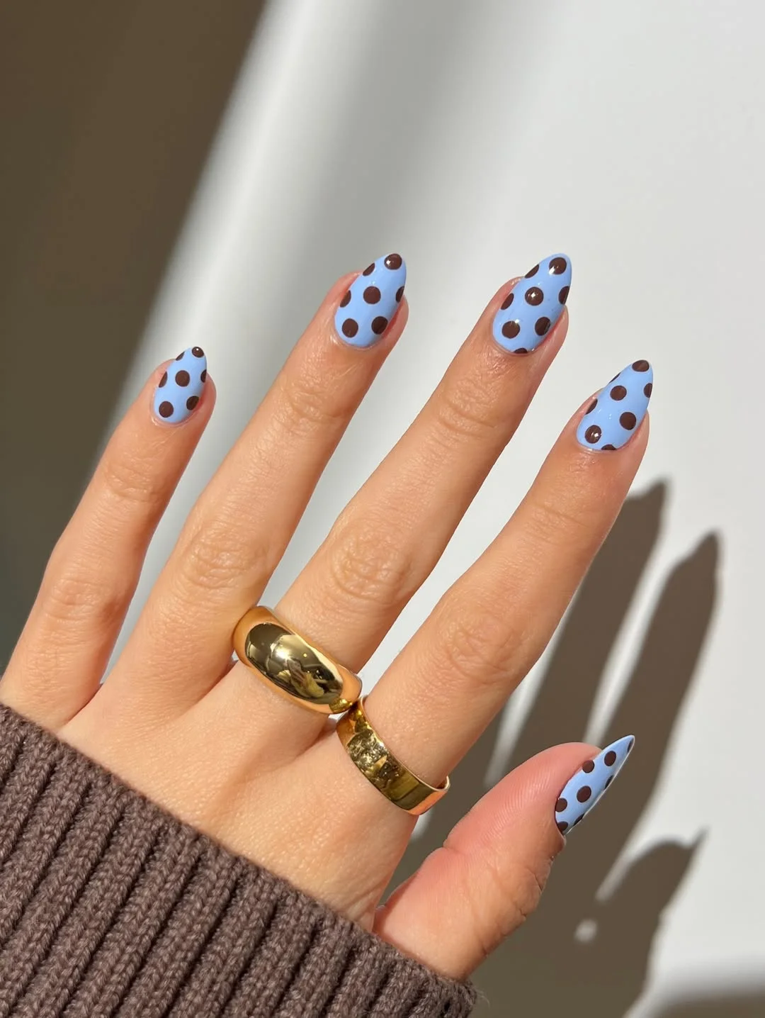 summer nails ideas june Sky Blue Polka Dot Almond Nails With Retro Energy
