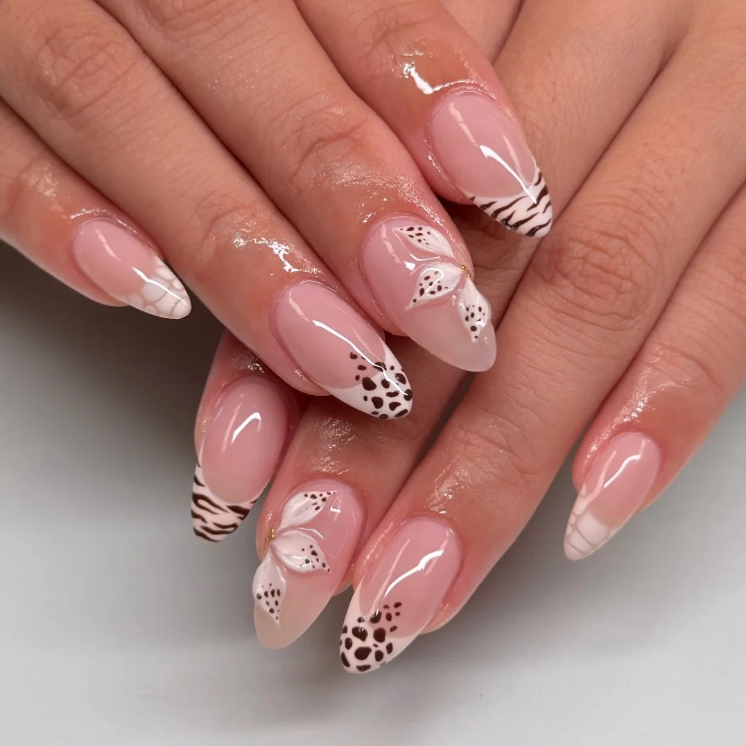 summer nails ideas june Soft Safari Almond Nails With Animal Print and Floral Details