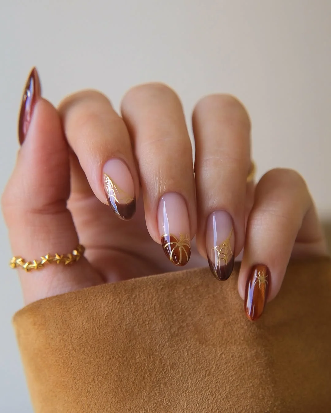 summer nails ideas june Mocha Chrome Almond Nails With Golden Spiderweb Accents