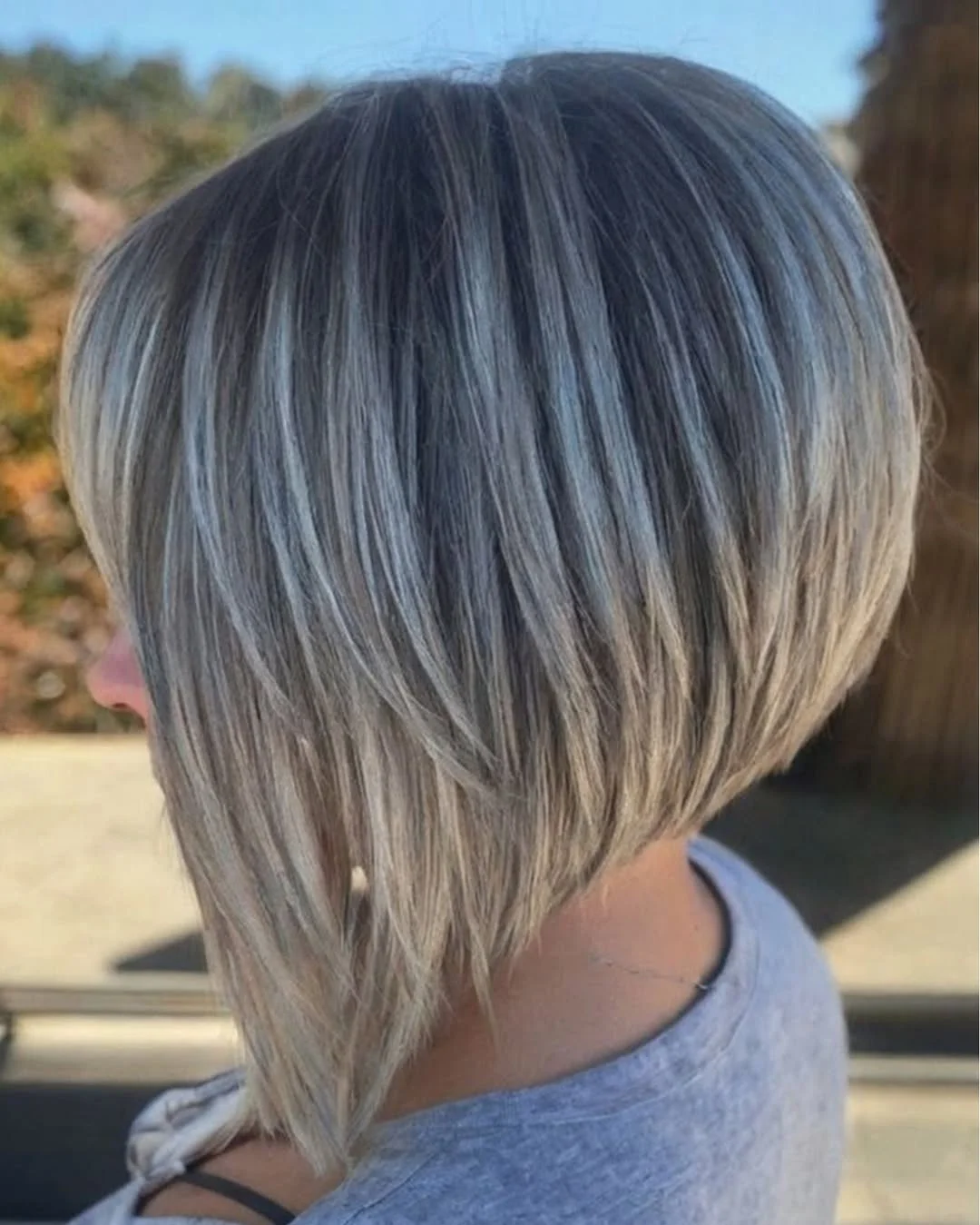 layered summer bob haircut 2026 Rounded French-Inspired Bob With Delicate Bangs