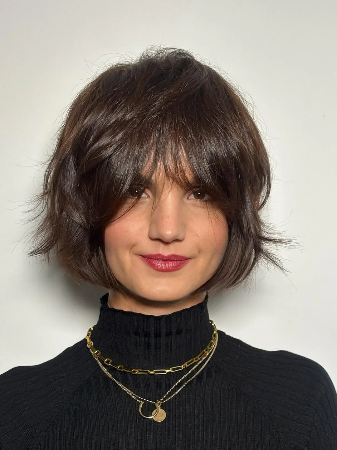 layered summer bob haircut 2026 French-Girl Texture With Soft Bangs And A Cropped Bob Shape