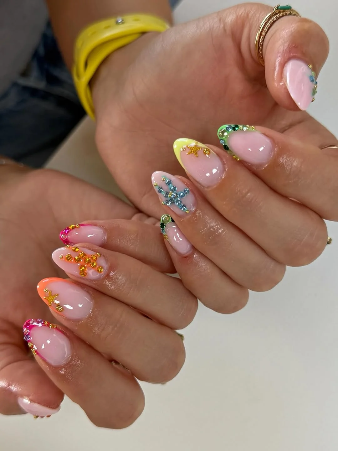 light summer nails 2026 + Jeweled Rainbow Tips with Tiny Starfish Charms