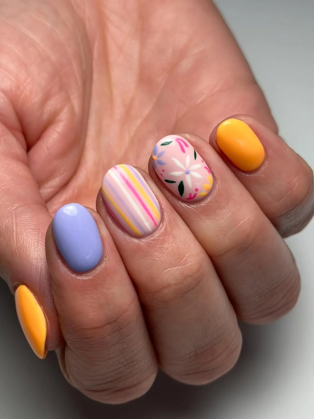 light summer nails 2026 + Pastel Stripes and Sunny Daisy Accents