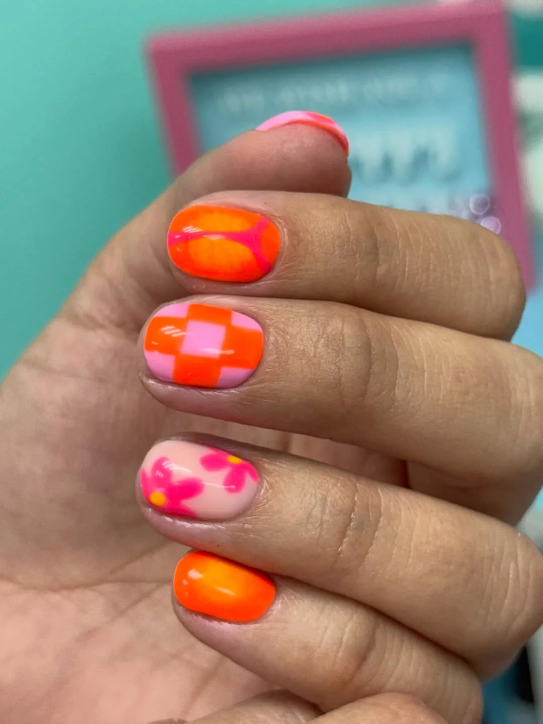 light summer nails 2026 + Neon Orange and Pink Mini Flower Nails