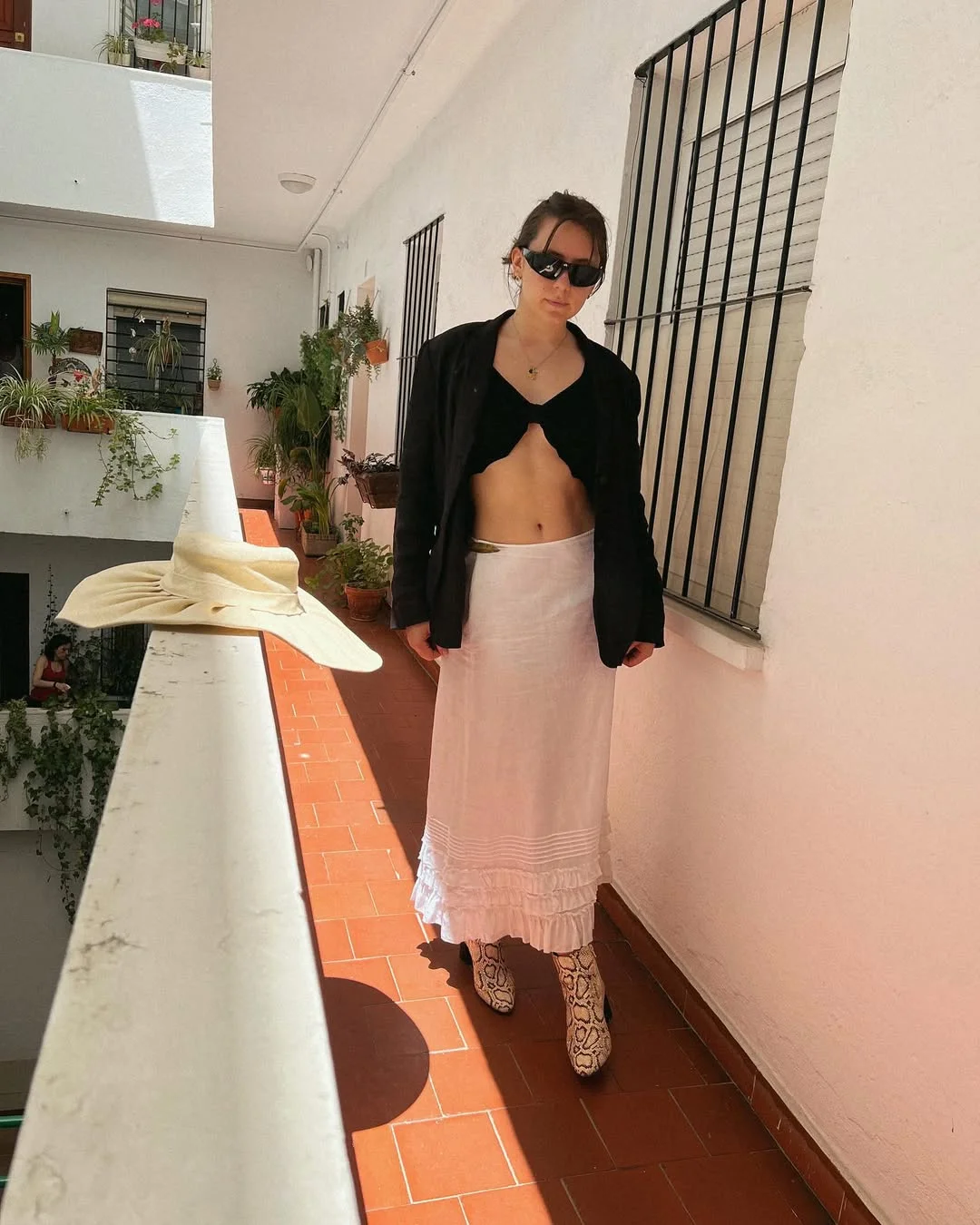 maxi skirt outfits summer 2026 White Ruffled Maxi Skirt With A Black Layered Top