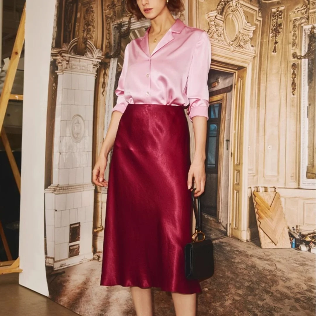 maxi skirt outfits summer 2026 Pink Satin Shirt With A Red Satin Maxi Skirt