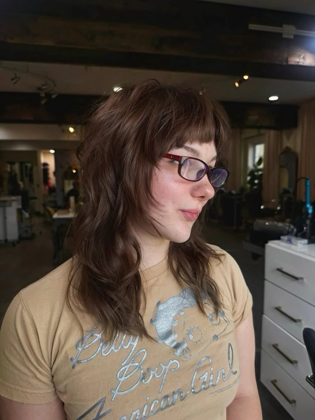 messy summer shag haircut 2026 Soft Brown Shag With Micro Bangs And Glasses