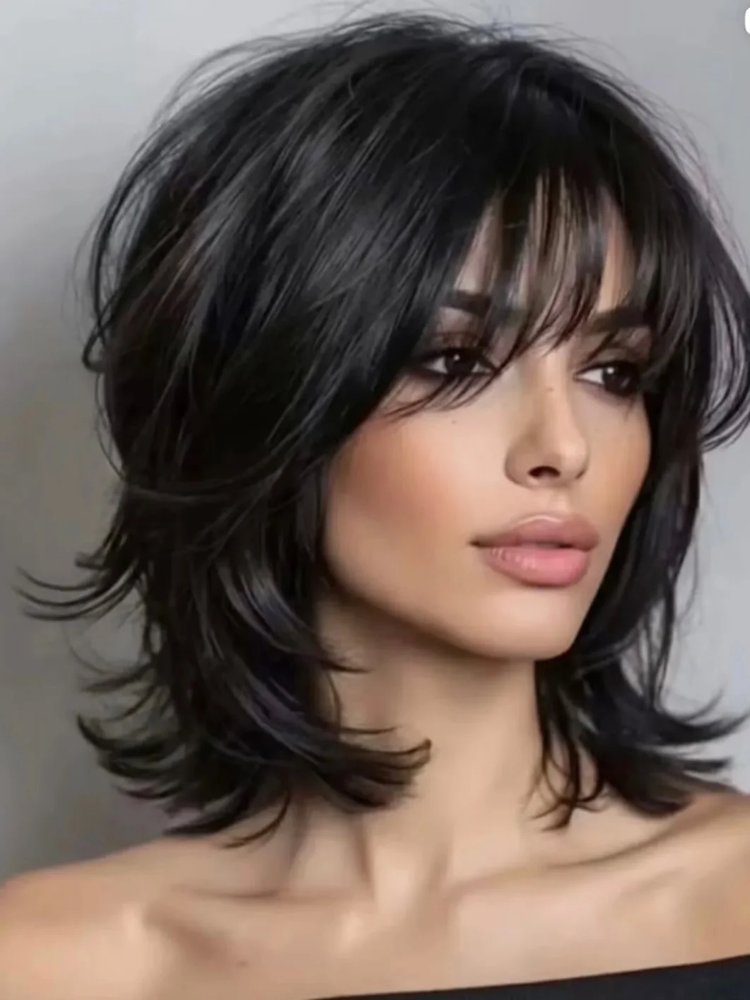 messy summer shag haircut 2026 Glossy Shoulder-Length Shag With Face-Framing Lift