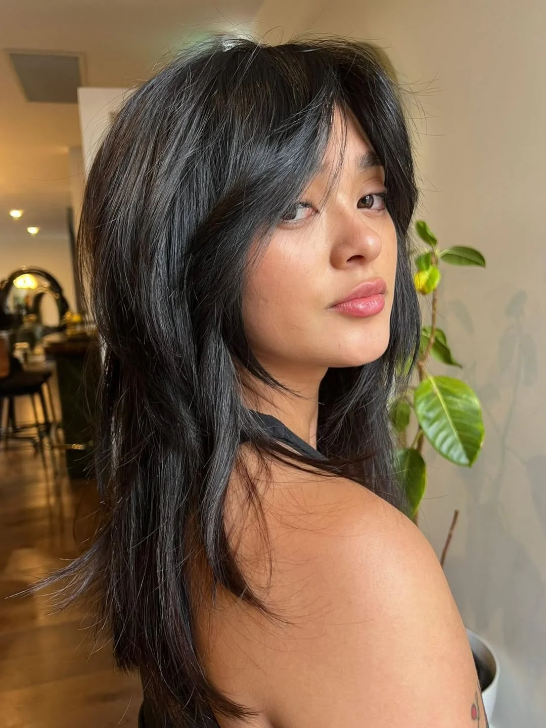 messy summer shag haircut 2026 Glossy Curtain Bangs With Sleek Shag Layers