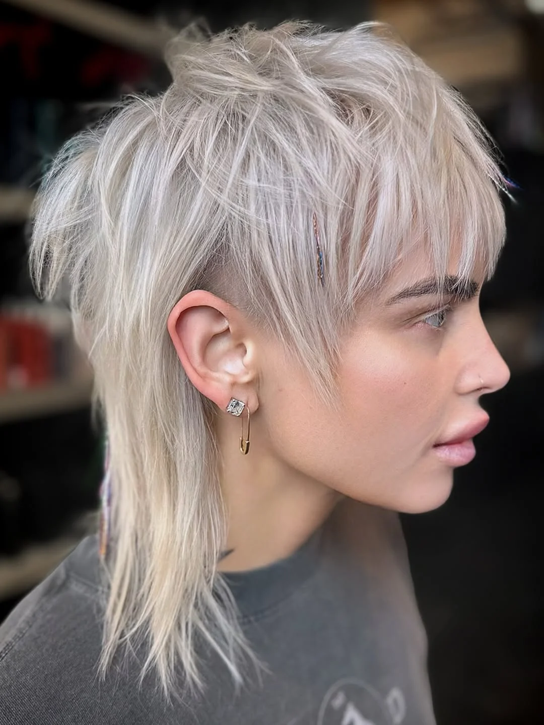 modern summer haircut 2026 Platinum Textured Mullet With A Soft Undercut