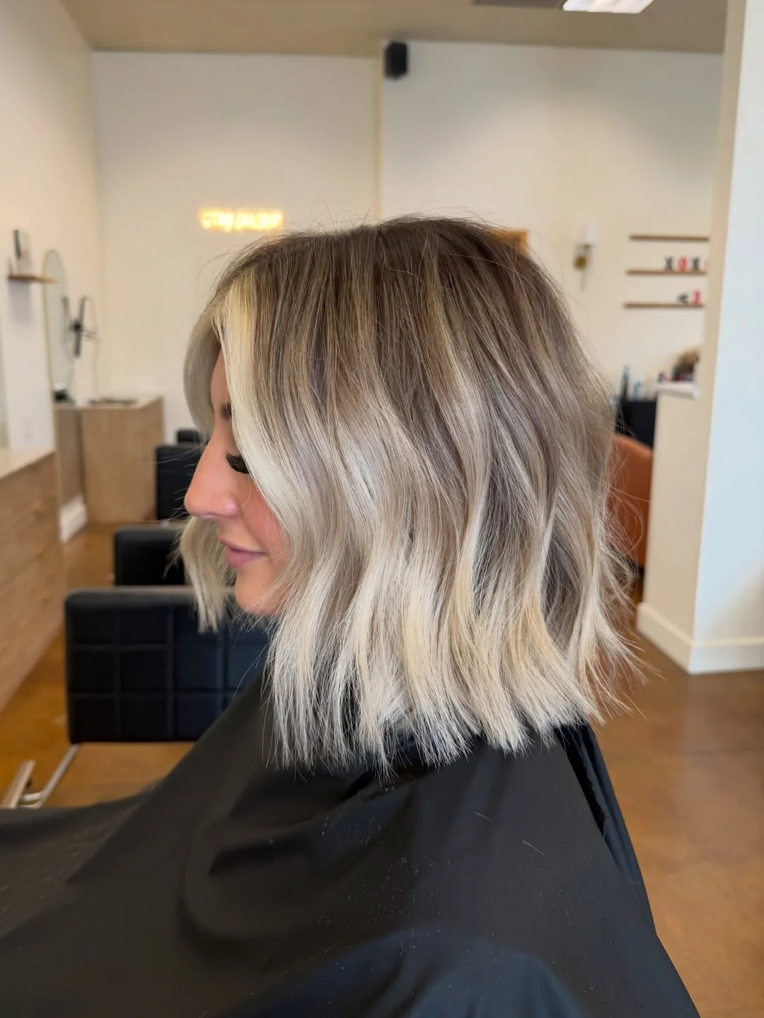 modern summer haircut 2026 Soft Blonde Textured Lob For Easy Summer Movement