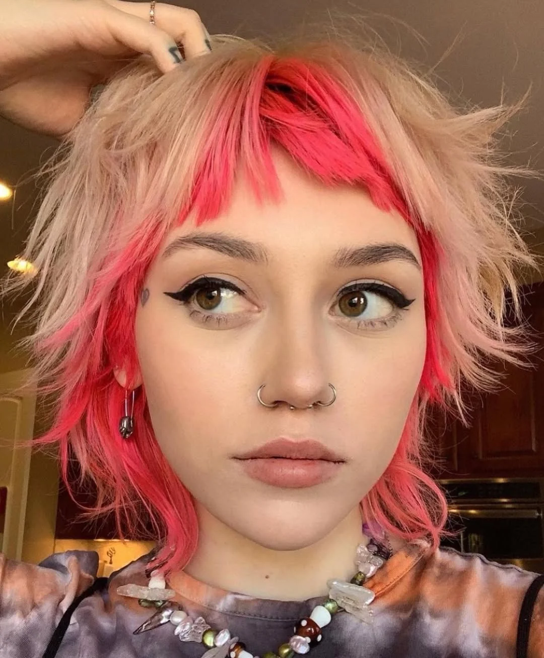 modern summer haircut 2026 Bubblegum Pink Shag With Choppy Fringe