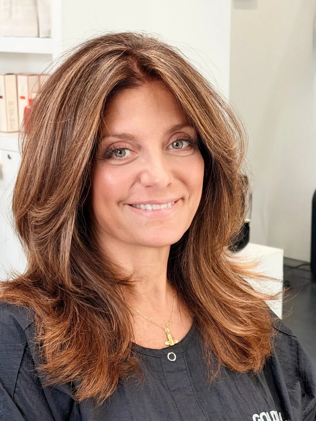 modern summer haircut 2026 Feathered Brunette Layers With Soft Face Framing