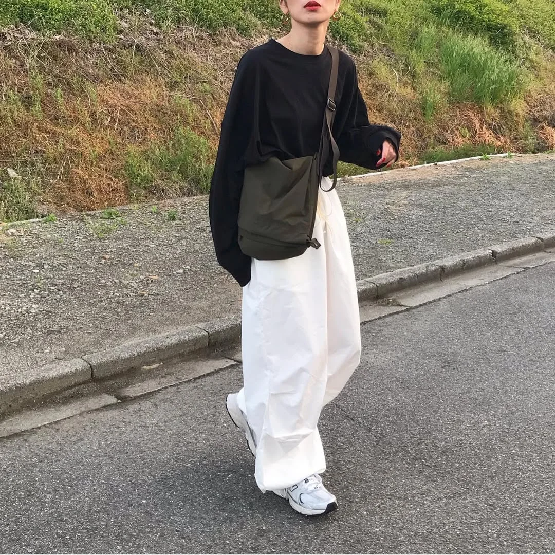 oversized summer outfit 2026 Black Oversized Tops and Wide White Trousers for Minimalist Styling