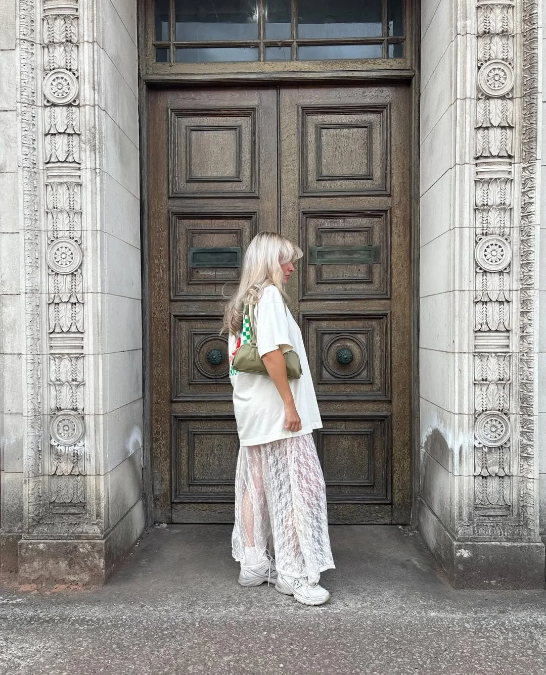 oversized summer outfit 2026 Oversized Graphic Tee Styling with Romantic Lace Layers