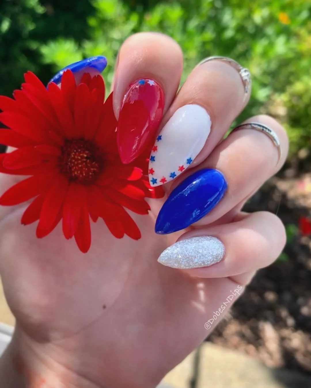 patriotic nails 2026 + Glossy Almond Nails with Star Confetti and Silver Sparkle