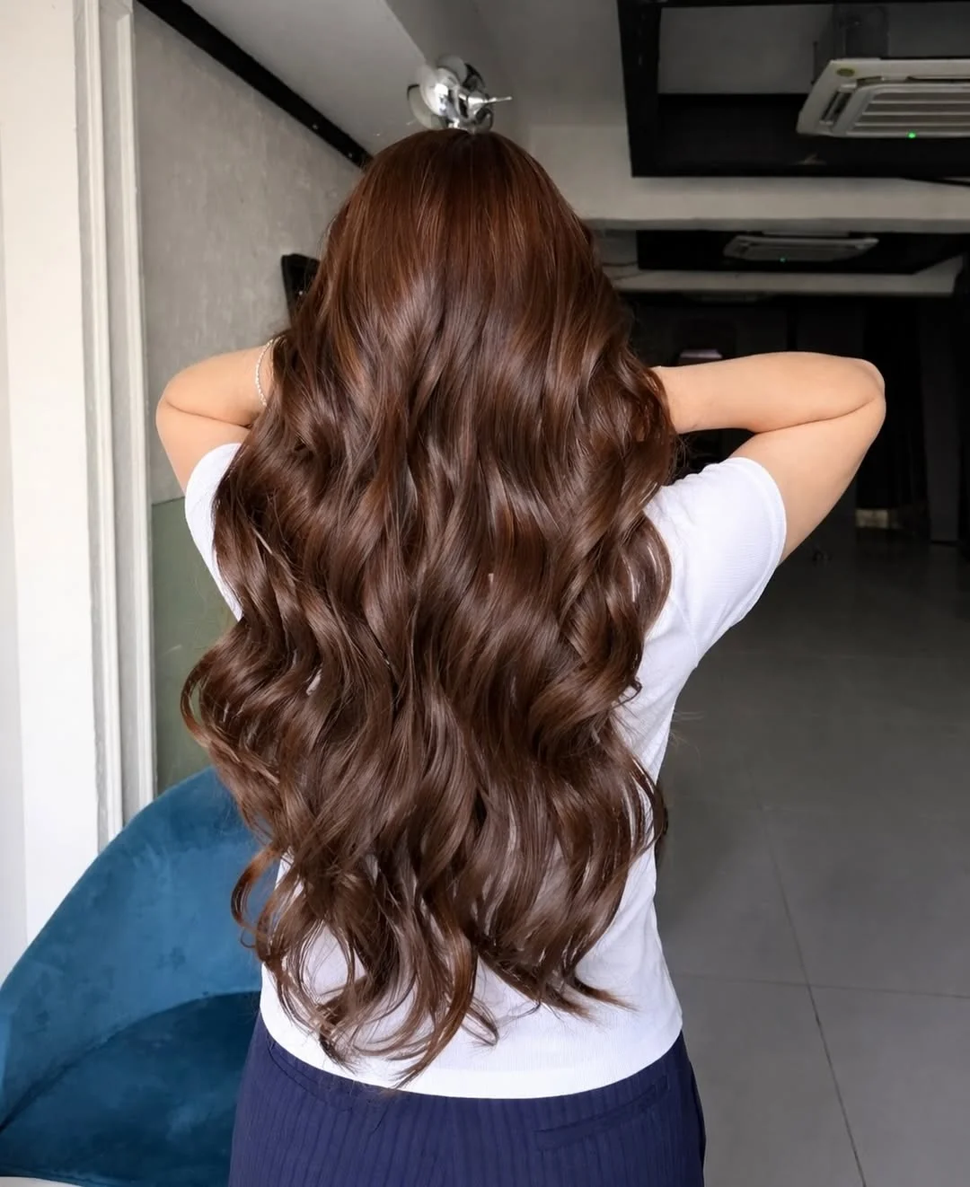 rich summer hair color ideas for brunettes 2026 + Glossy Chestnut Brunette With Melted Cocoa Waves