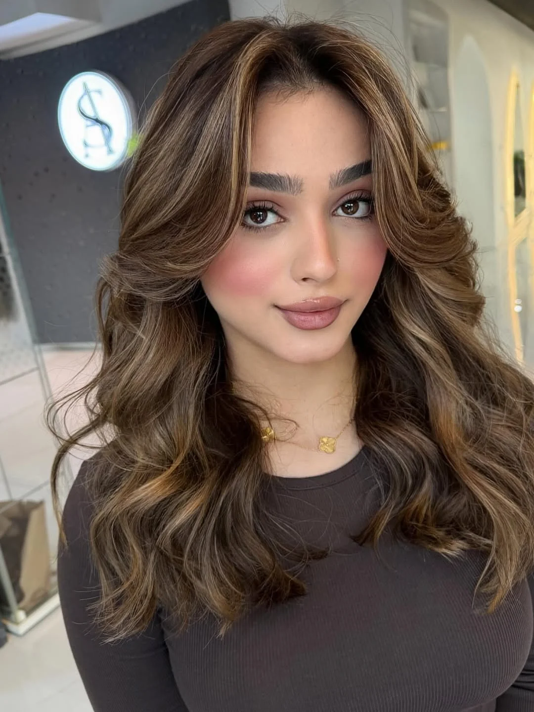 rich summer hair color ideas for brunettes 2026 + Cocoa Butterfly Layers With Golden Face Framing Accents