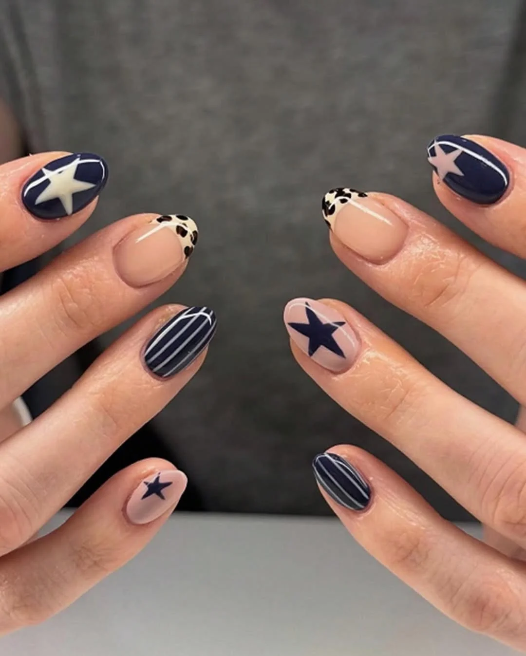 short squoval nails design 2026 + Navy Stars and Animal Print Tips for Short Statement Nails