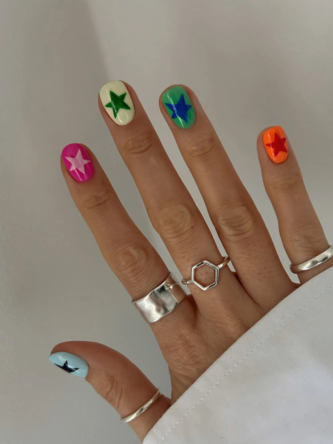 short squoval nails design 2026 + Candy Bright Stars for Playful Summer Short Nails