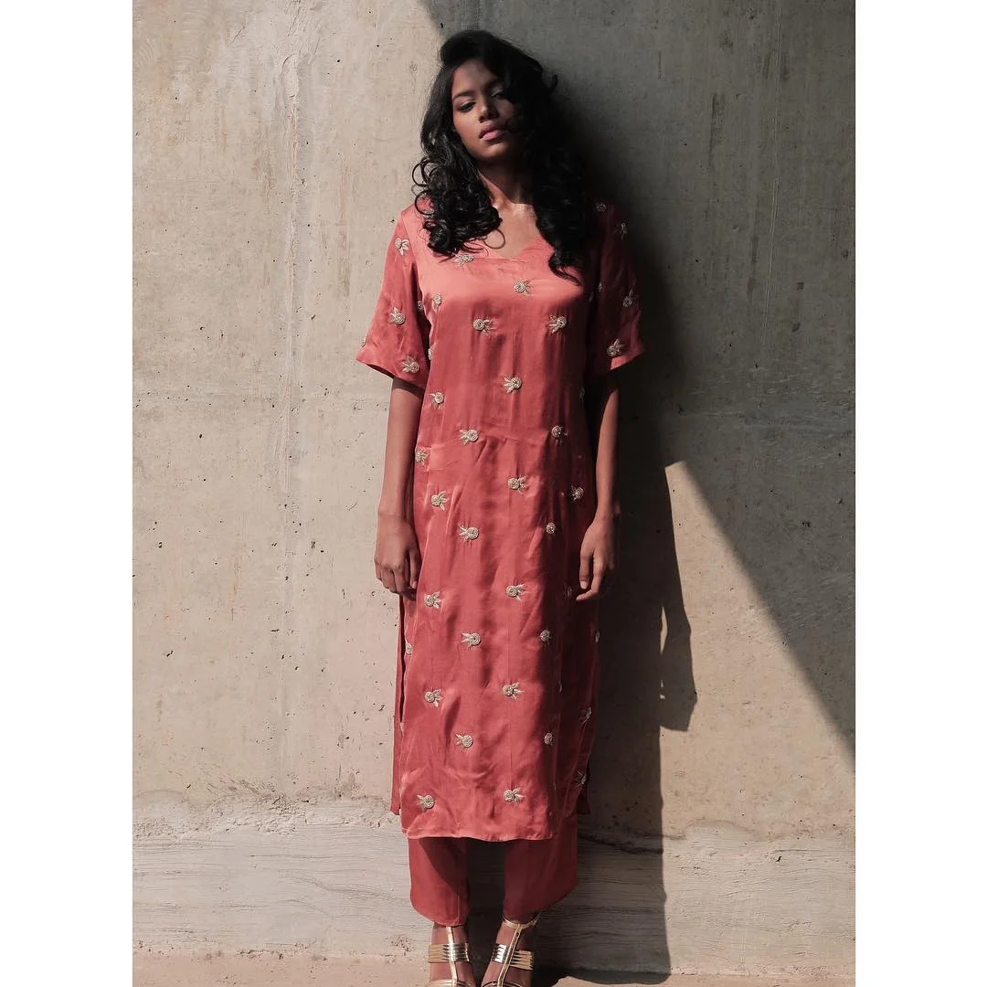 summer clothes essentials 2026 Minimal Embroidered Tunics That Bring Warmth to Neutral Styling