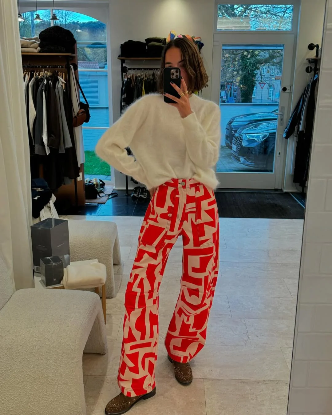 summer clothes essentials 2026 Soft White Knit With Red Statement Pants For Cool Summer Evenings