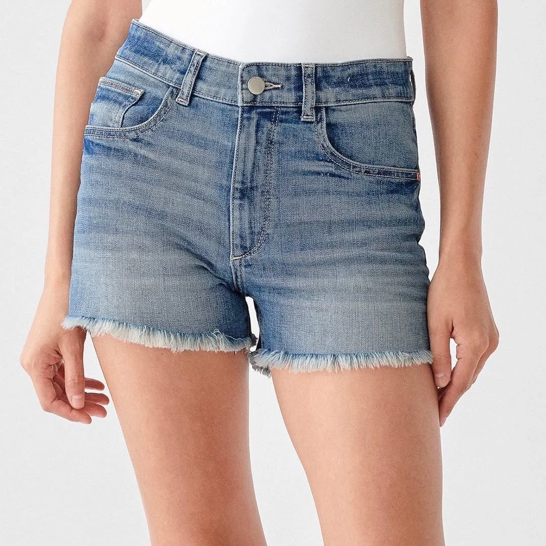 summer denim shorts 2026 Light Wash Raw Hem Shorts As A Summer Essential