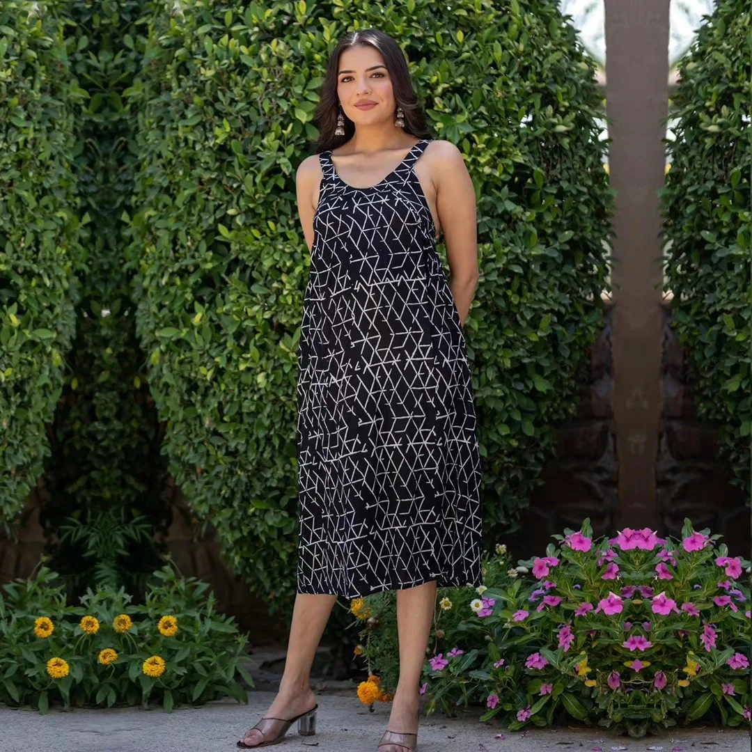 summer sleeveless dresses 2026 Black Geometric Midi Dress With Garden Simplicity