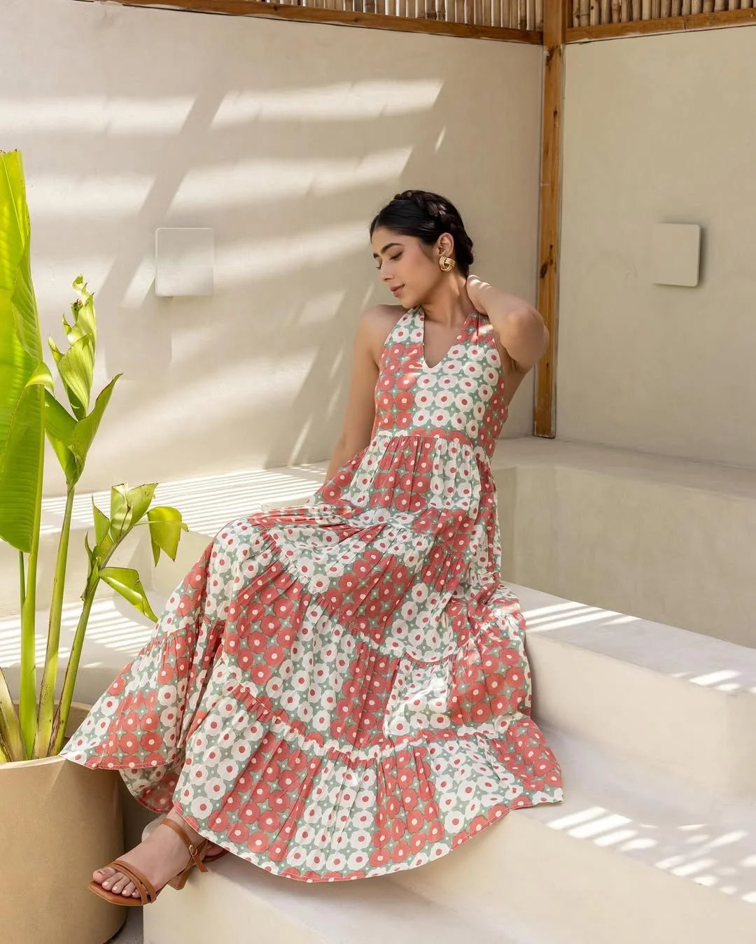 summer sleeveless dresses 2026 Coral Halter Maxi Dress With A Softer Vacation Mood