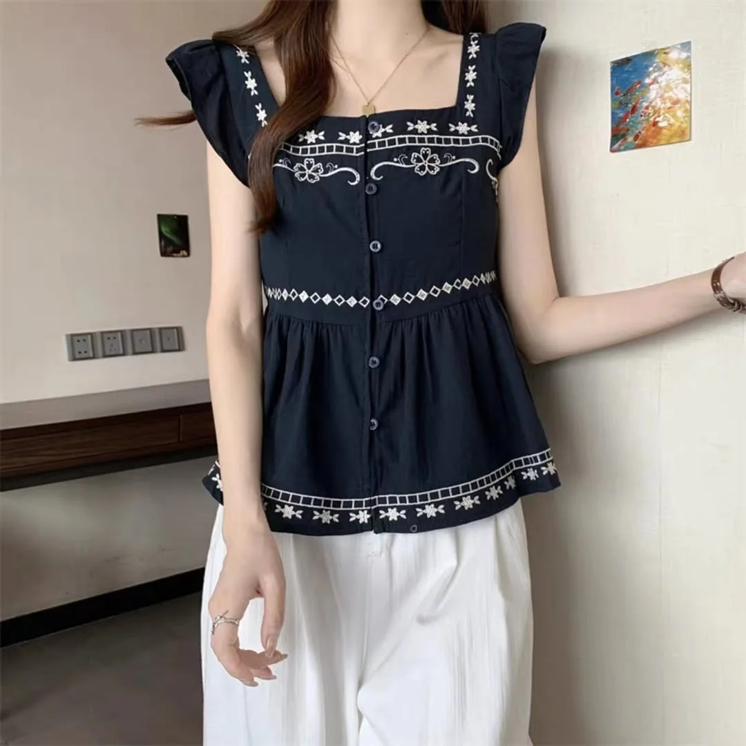 summer sleeveless tops 2026 Embroidered Black Blouse With Airy White Pants