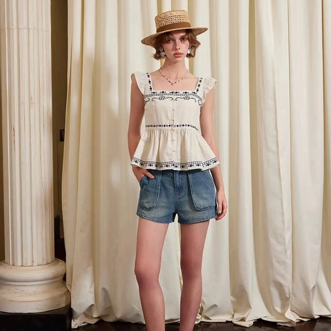 summer sleeveless tops 2026 Embroidered Peplum Blouse With Denim Shorts